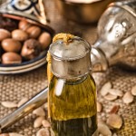Still life of argan oil with fruits